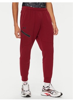 Under Armour Spodnie dresowe UA Unstoppable 1389353 Czerwony Regular Fit ze sklepu MODIVO w kategorii Spodnie męskie - zdjęcie 182705438