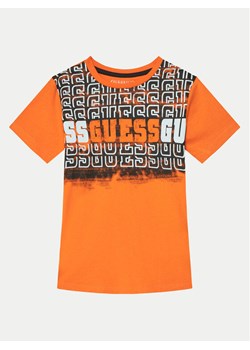 Guess T-Shirt L5RI23 K8HM4 Pomarańczowy Regular Fit ze sklepu MODIVO w kategorii T-shirty chłopięce - zdjęcie 182705487
