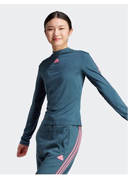 adidas Bluzka IU3073 Turkusowy Slim Fit ze sklepu MODIVO w kategorii Bluzki damskie - zdjęcie 182705786