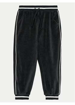 United Colors Of Benetton Spodnie dresowe 3UK0CF057 Czarny Regular Fit ze sklepu MODIVO w kategorii Spodnie chłopięce - zdjęcie 182706335