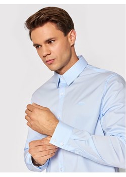 Guess Koszula Sunset M1YH20 W7ZK1 Błękitny Slim Fit ze sklepu MODIVO w kategorii Koszule męskie - zdjęcie 182706528