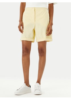 Tommy Hilfiger Szorty materiałowe WW0WW42457 Żółty Regular Fit ze sklepu MODIVO w kategorii Szorty - zdjęcie 182707848