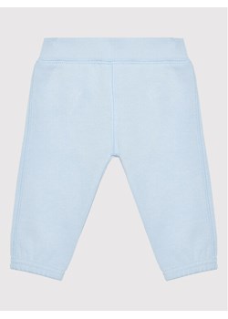 United Colors Of Benetton Spodnie dresowe 3J70AF009 Błękitny Regular Fit ze sklepu MODIVO w kategorii Spodnie i półśpiochy - zdjęcie 182708408