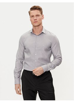 Calvin Klein Koszula K10K112588 Granatowy Slim Fit ze sklepu MODIVO w kategorii Koszule męskie - zdjęcie 182708806