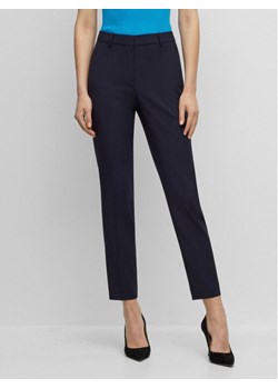 Boss Spodnie materiałowe 50490051 Granatowy Regular Fit ze sklepu MODIVO w kategorii Spodnie damskie - zdjęcie 182709507