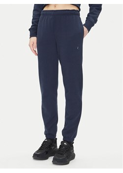 Save The Duck Spodnie dresowe DF1192W CLEE20 Granatowy Regular Fit ze sklepu MODIVO w kategorii Spodnie damskie - zdjęcie 182709938
