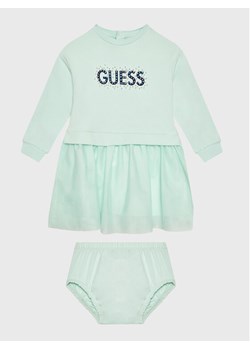 Guess Sukienka elegancka A3RK08 KA6V0 Zielony Regular Fit - id: 0000302044382 - marki Guess - 182711745 Guess Sukienka elegancka A3RK08 KA6V0 Zielony Regular Fit ze sklepu MODIVO w kategorii Sukienki niemowlęce - zdjęcie 182711745
