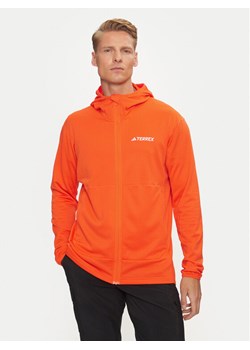 adidas Bluza techniczna Terrex Xperior Light IQ3720 Pomarańczowy Slim Fit ze sklepu MODIVO w kategorii Bluzy męskie - zdjęcie 182712609