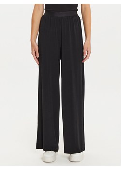 Boss Spodnie dresowe Bea 50525712 Czarny Relaxed Fit ze sklepu MODIVO w kategorii Spodnie damskie - zdjęcie 182712619