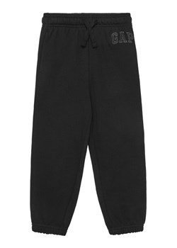 Gap Spodnie dresowe 743964-00 Czarny Regular Fit ze sklepu MODIVO w kategorii Spodnie chłopięce - zdjęcie 182712625