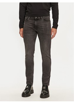 Hugo Jeansy 734 50522140 Czarny Extra Slim Fit ze sklepu MODIVO w kategorii Jeansy męskie - zdjęcie 182713447