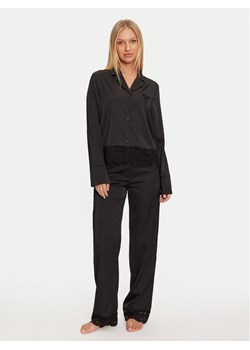 Guess Piżama O4BX02 WEFC2 Czarny Regular Fit ze sklepu MODIVO w kategorii Piżamy damskie - zdjęcie 182714715
