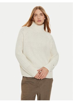 Tommy Hilfiger Golf WW0WW44111 Écru Regular Fit ze sklepu MODIVO w kategorii Swetry damskie - zdjęcie 182714907