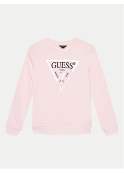 Guess Bluzka J74Q10 KAUG0 Różowy Regular Fit ze sklepu MODIVO w kategorii Bluzki dziewczęce - zdjęcie 182716879