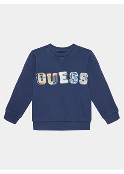 Guess Bluza N4GQ04 KA6R3 Granatowy Regular Fit ze sklepu MODIVO w kategorii Bluzy chłopięce - zdjęcie 182717815
