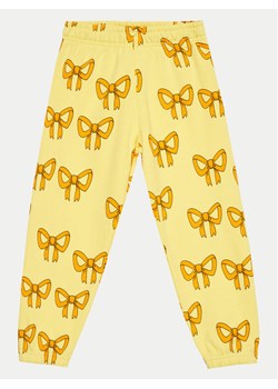 Mini Rodini Spodnie dresowe Bow 2473013323 Żółty Regular Fit ze sklepu MODIVO w kategorii Spodnie dziewczęce - zdjęcie 182718135