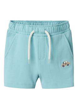 NAME IT Szorty sportowe Fritzo 13238144 Błękitny Regular Fit ze sklepu MODIVO w kategorii Spodenki chłopięce - zdjęcie 182719325