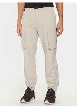 Helly Hansen Spodnie żeglarskie Arc 22 53725 Beżowy Regular Fit ze sklepu MODIVO w kategorii Spodnie męskie - zdjęcie 182719926