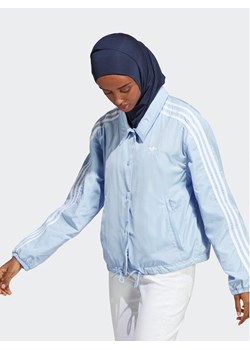 adidas Kurtka przejściowa Adicolor Classics 3-Stripes Coach Jacket IC5480 Błękitny Loose Fit ze sklepu MODIVO w kategorii Kurtki damskie - zdjęcie 182721296