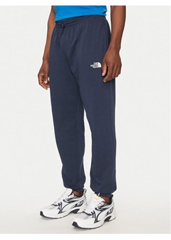 The North Face Spodnie dresowe Simple Dome Light NF0A8C41 Granatowy Regular Fit ze sklepu MODIVO w kategorii Spodnie męskie - zdjęcie 182721828