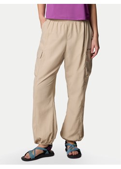Columbia Spodnie outdoor Sandier™ Parachute Pant 2119061 Beżowy Relaxed Fit ze sklepu MODIVO w kategorii Spodnie damskie - zdjęcie 182721935