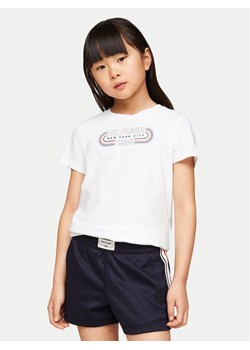 Tommy Hilfiger T-Shirt 1985 KG0KG07858 Biały Regular Fit ze sklepu MODIVO w kategorii Bluzki dziewczęce - zdjęcie 182722559