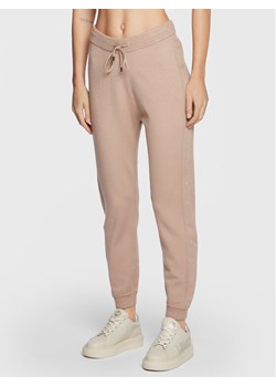 Liu Jo Sport Spodnie dzianinowe TF2106 MA63M Beżowy Regular Fit ze sklepu MODIVO w kategorii Spodnie damskie - zdjęcie 182722715