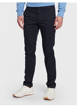 Tommy Hilfiger Chinosy Core Bleecker MW0MW28883 Granatowy Slim Fit ze sklepu MODIVO w kategorii Spodnie męskie - zdjęcie 182722718