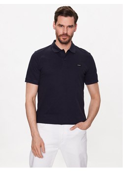 Calvin Klein Polo K10K111196 Granatowy Slim Fit ze sklepu MODIVO w kategorii T-shirty męskie - zdjęcie 182723008