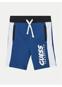 Guess Szorty sportowe L5RD01 KA6R4 Niebieski Regular Fit ze sklepu MODIVO w kategorii Spodenki chłopięce - zdjęcie 182723499