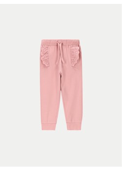 Coccodrillo Spodnie dresowe WC4121101GPN Różowy Regular Fit ze sklepu MODIVO w kategorii Spodnie i półśpiochy - zdjęcie 182724238
