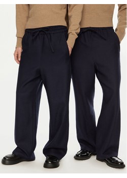 AMI PARIS Spodnie dresowe UTR212.WV0018 Granatowy Regular Fit ze sklepu MODIVO w kategorii Spodnie męskie - zdjęcie 182726076