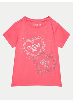 Guess T-Shirt K4BI01 J1314 Różowy Regular Fit ze sklepu MODIVO w kategorii Bluzki dziewczęce - zdjęcie 182726777