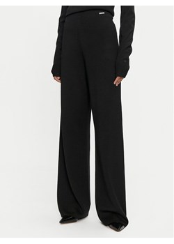 Calvin Klein Spodnie dzianinowe K20K207680 Czarny Straight Fit ze sklepu MODIVO w kategorii Spodnie damskie - zdjęcie 182727066