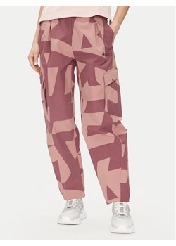 adidas Spodnie outdoor Terrex Xploric Cargo JE9430 Różowy Loose Fit ze sklepu MODIVO w kategorii Spodnie damskie - zdjęcie 182727275