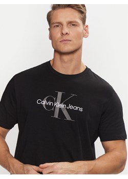 Calvin Klein Jeans T-Shirt Ss Hero Monogram Tee 30s Eu Opt 00040EM286 Czarny Regular Fit ze sklepu MODIVO w kategorii T-shirty męskie - zdjęcie 182728477