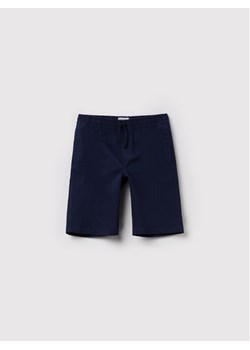 OVS Szorty materiałowe 1445878 Granatowy Regular Fit ze sklepu MODIVO w kategorii Spodenki chłopięce - zdjęcie 182728578