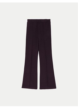 Coccodrillo Legginsy ZC4122701AGJ Fioletowy Slim Fit ze sklepu MODIVO w kategorii Spodnie dziewczęce - zdjęcie 182728685