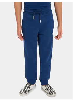 Calvin Klein Jeans Spodnie dresowe Stack Logo IB0IB01282 Granatowy Regular Fit ze sklepu MODIVO w kategorii Spodnie chłopięce - zdjęcie 182729355