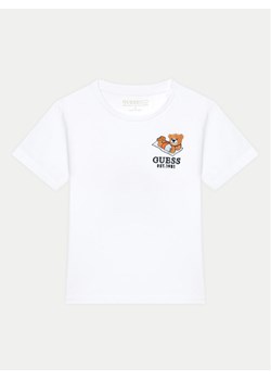 Guess T-Shirt N5GI08 K8HM4 Biały Regular Fit ze sklepu MODIVO w kategorii Bluzki dziewczęce - zdjęcie 182729709