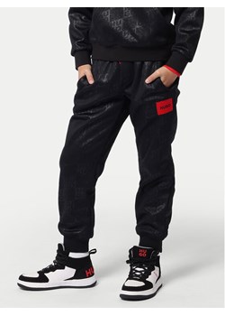 Hugo Spodnie dresowe G00180 M Czarny Regular Fit ze sklepu MODIVO w kategorii Spodnie chłopięce - zdjęcie 182729756