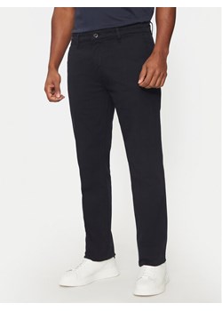 Guess Spodnie materiałowe M4BB16 WGHG1 Niebieski Regular Fit ze sklepu MODIVO w kategorii Spodnie męskie - zdjęcie 182730426