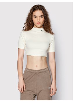 Reebok Bluzka HH7370 Beżowy Slim Fit ze sklepu MODIVO w kategorii Bluzki damskie - zdjęcie 182731406