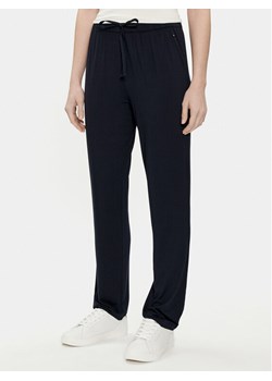 Tommy Hilfiger Spodnie dresowe UW0UW02842 Granatowy Regular Fit ze sklepu MODIVO w kategorii Spodnie damskie - zdjęcie 182731529