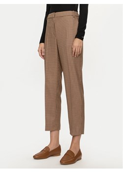 Tommy Hilfiger Spodnie materiałowe WW0WW42965 Beżowy Regular Fit ze sklepu MODIVO w kategorii Spodnie damskie - zdjęcie 182731768