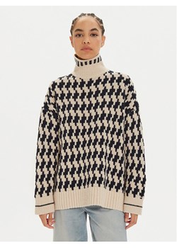 Tommy Hilfiger Golf WW0WW42265 Beżowy Relaxed Fit ze sklepu MODIVO w kategorii Swetry damskie - zdjęcie 182731815