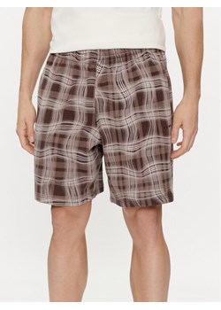 adidas Szorty sportowe Reveal Allover Print HM4949 Brązowy Regular Fit ze sklepu MODIVO w kategorii Spodenki męskie - zdjęcie 182731967