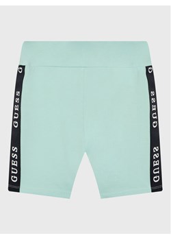 Guess Szorty sportowe J3RD14 KABR0 Niebieski Slim Fit ze sklepu MODIVO w kategorii Spodenki chłopięce - zdjęcie 182732137