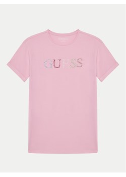 Guess T-Shirt J5GI38 J1314 Różowy Regular Fit ze sklepu MODIVO w kategorii Bluzki dziewczęce - zdjęcie 182733685