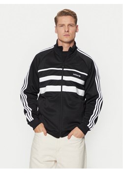 adidas Bluza The First Track JP1046 Czarny Regular Fit ze sklepu MODIVO w kategorii Bluzy męskie - zdjęcie 182733709
